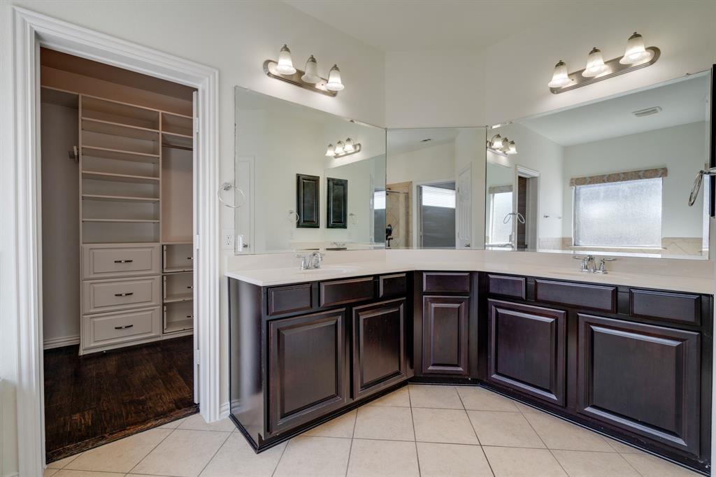 303 San Marcos Drive Irving, TX 75039 - Photo 11 of 33 a kitchen with a sink and cabinets