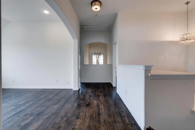 a view of a livingroom with wooden floor