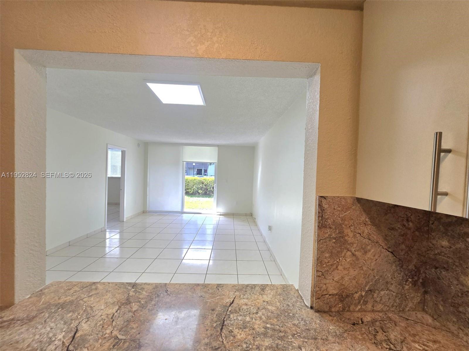 10090 Northwest 80th Court, Unit 1155 Hialeah Gardens, FL 33016 - Photo 5 of 19 a view interior of the house