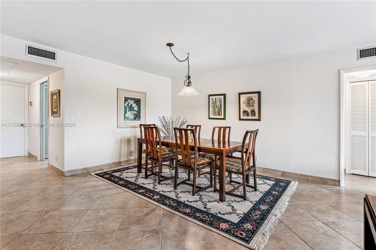 3800 Oaks Clubhouse Drive, Unit 307 Pompano Beach, FL 33069 - Photo 8 of 25 a view of a dining room with furniture