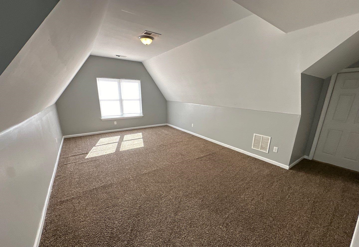 9420 Grove Road Cordova, TN 38016 - Photo 10 of 15 an empty room with windows