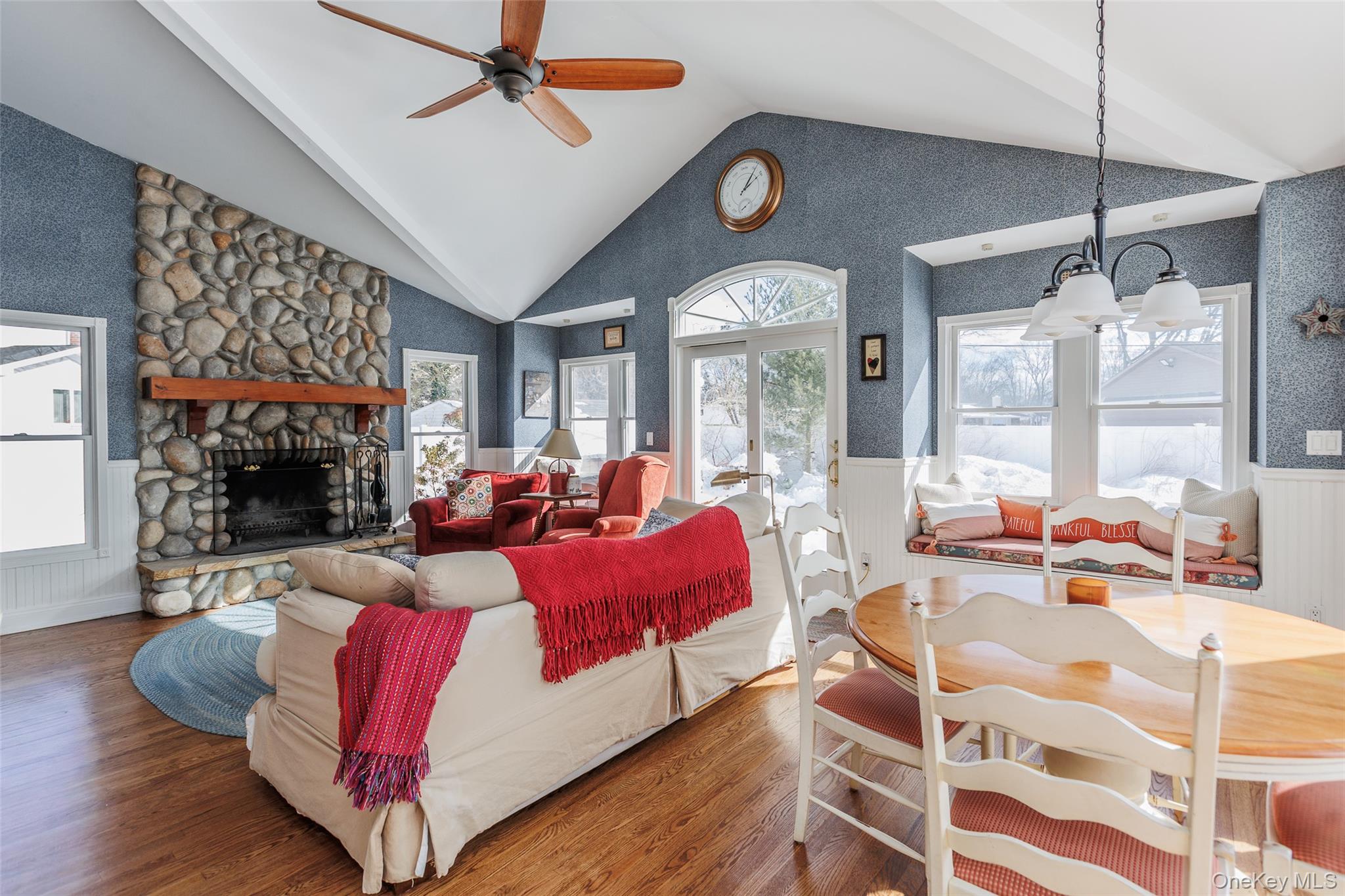 45 Terry Lane Commack, NY 11725 - Photo 11 of 34 a living room with furniture fireplace and a large window