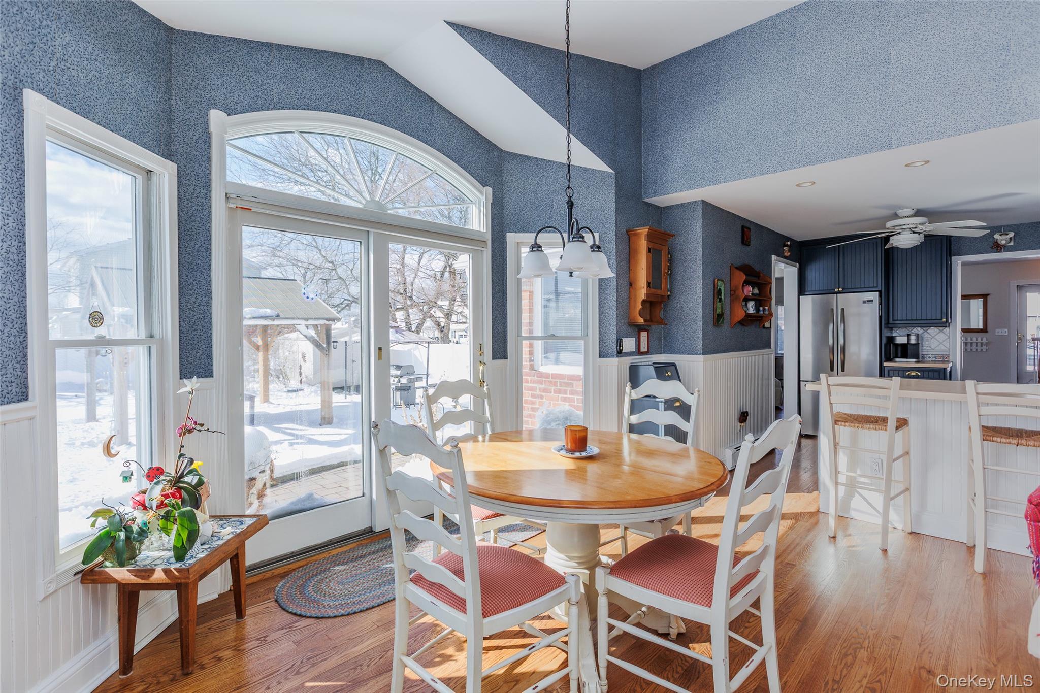45 Terry Lane Commack, NY 11725 - Photo 13 of 34 a view of a dining room with furniture window and wooden floor