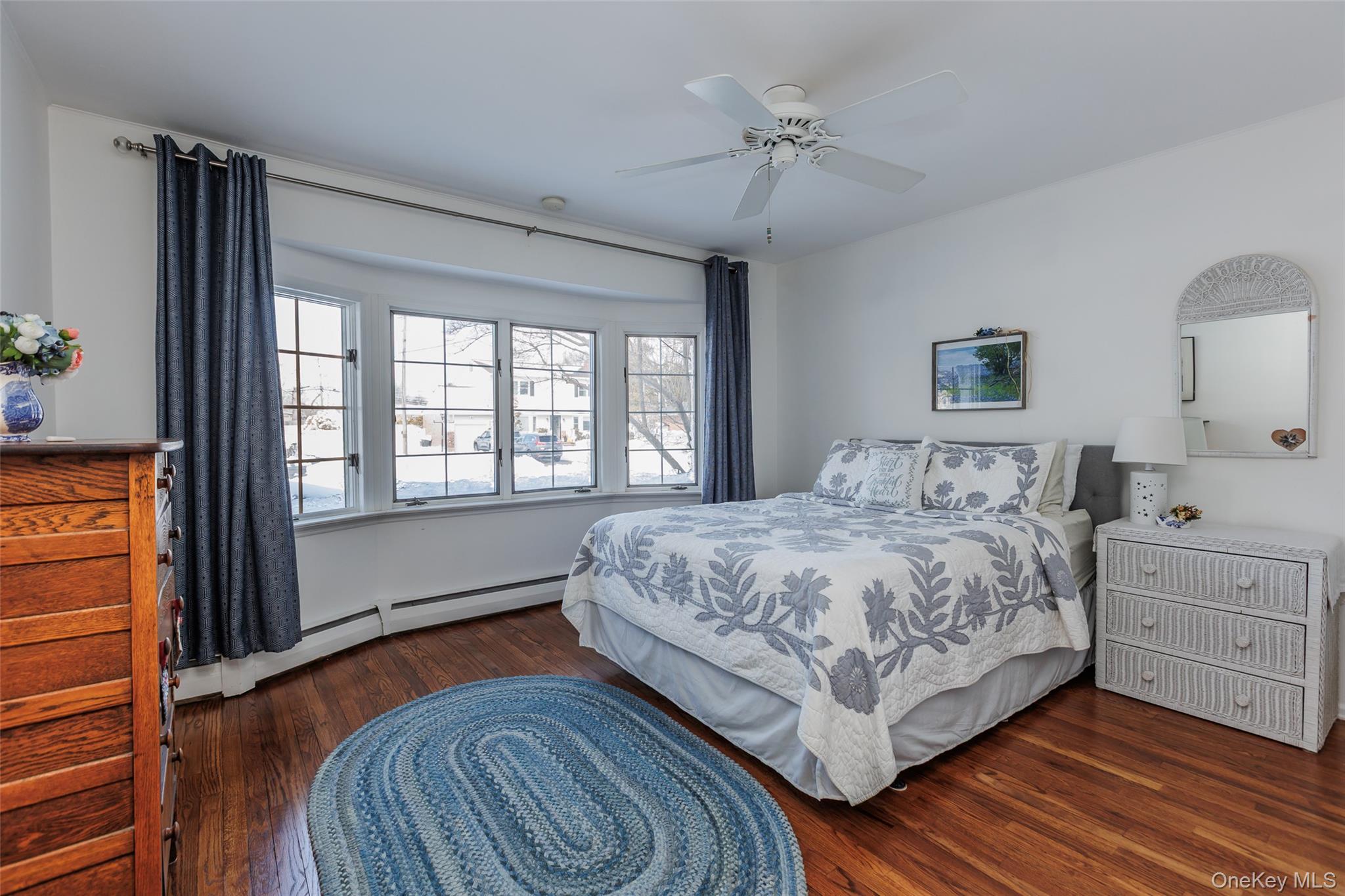 45 Terry Lane Commack, NY 11725 - Photo 15 of 34 a bedroom with a bed and a window