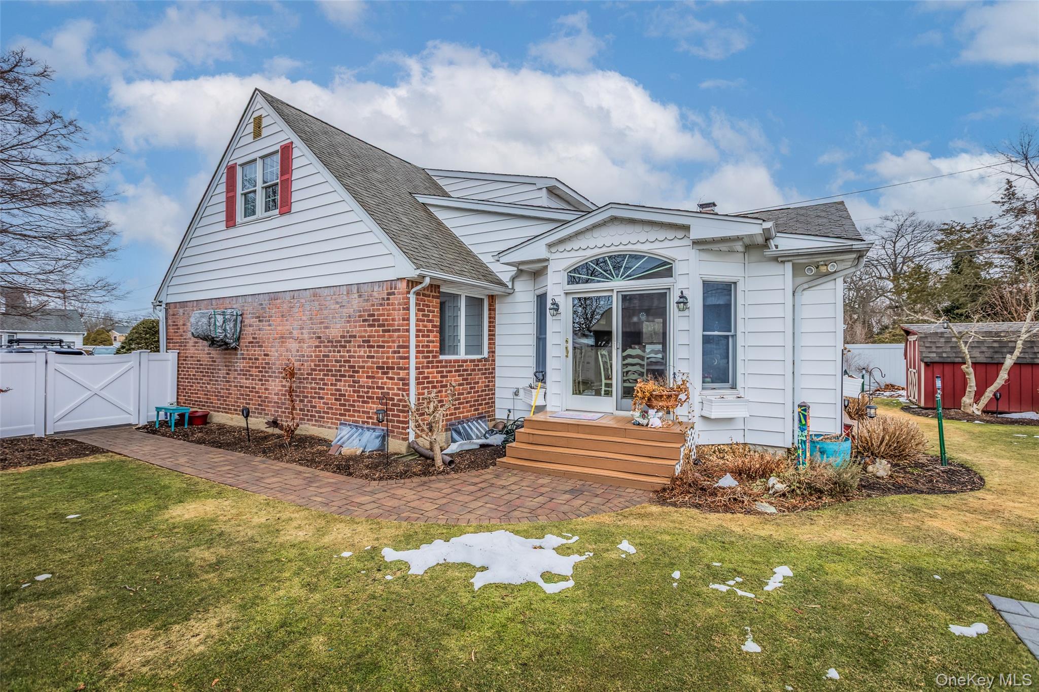45 Terry Lane Commack, NY 11725 - Photo 26 of 34 a view of a house with backyard porch and sitting area