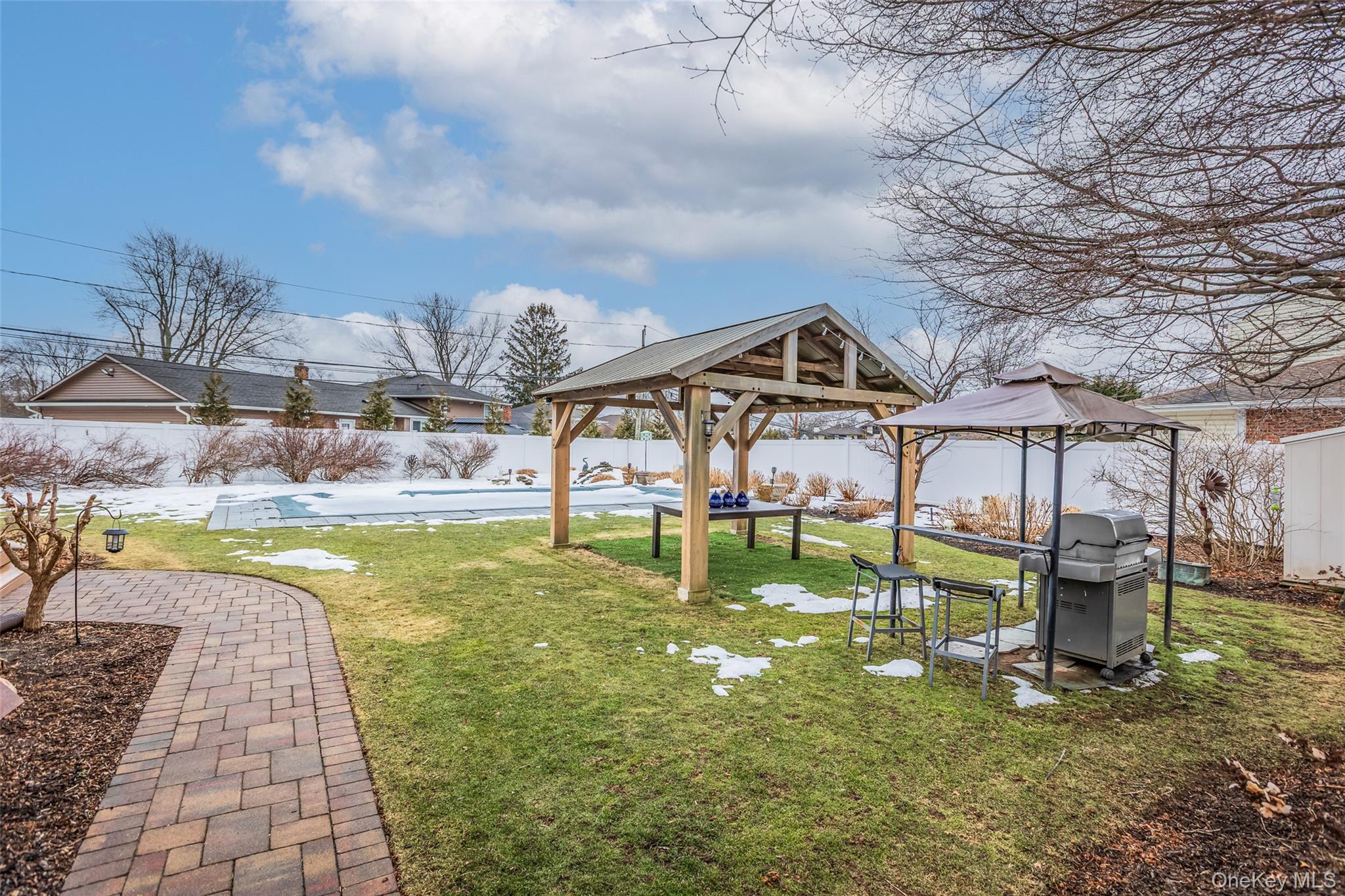 45 Terry Lane Commack, NY 11725 - Photo 27 of 34 a view of a house with a yard balcony and sitting area
