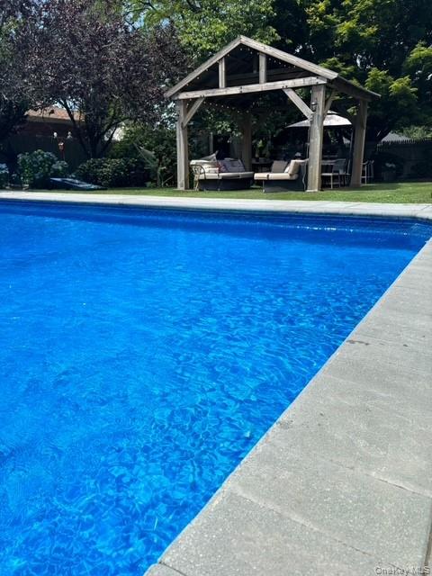 45 Terry Lane Commack, NY 11725 - Photo 29 of 34 a view of a wooden deck with a yard