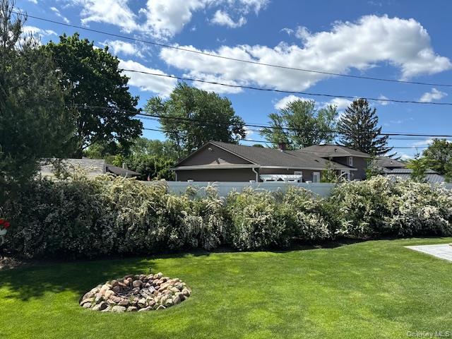 45 Terry Lane Commack, NY 11725 - Photo 32 of 34 a view of an outdoor space and a yard