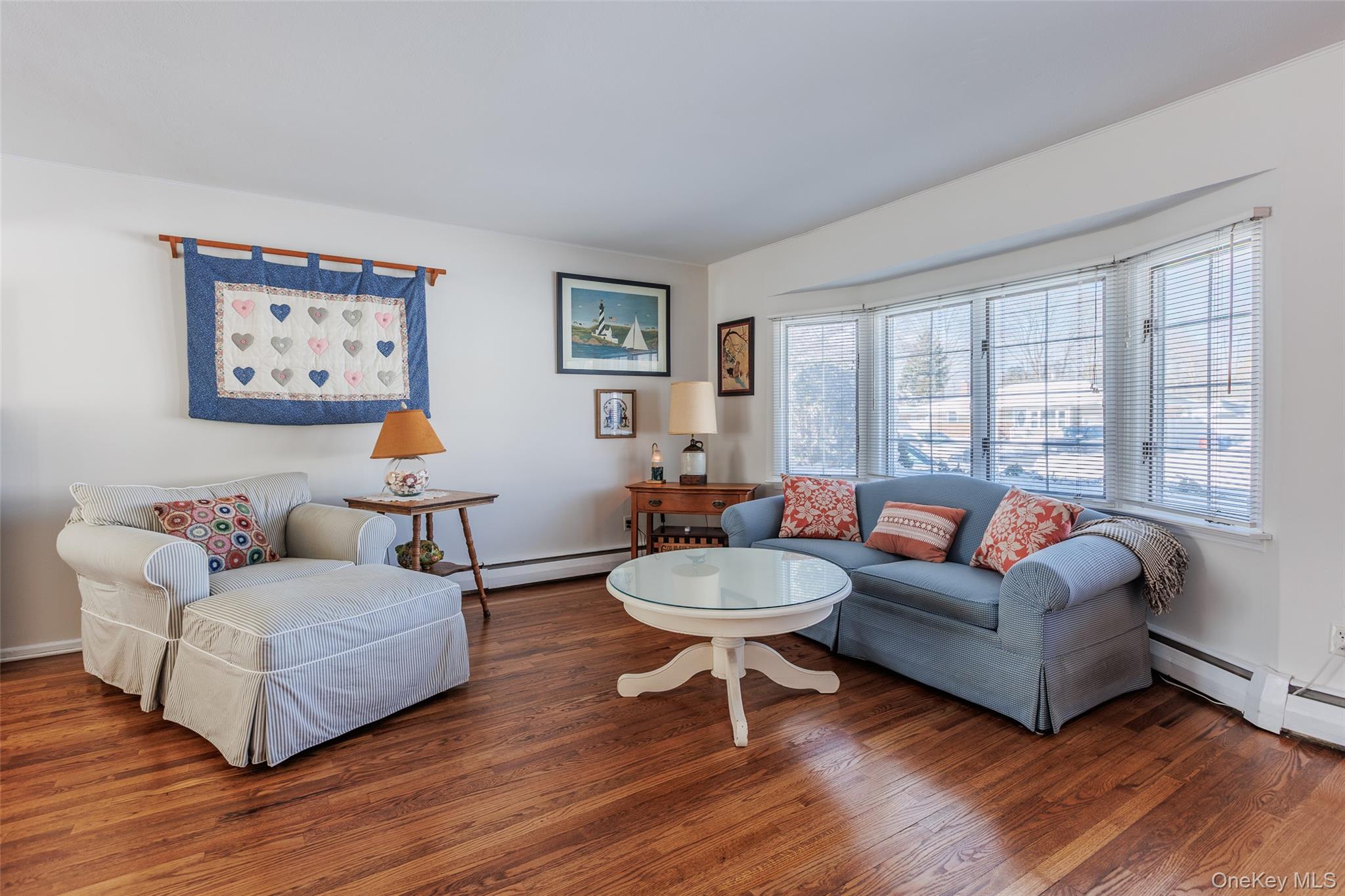 45 Terry Lane Commack, NY 11725 - Photo 5 of 34 a living room with furniture and a large window