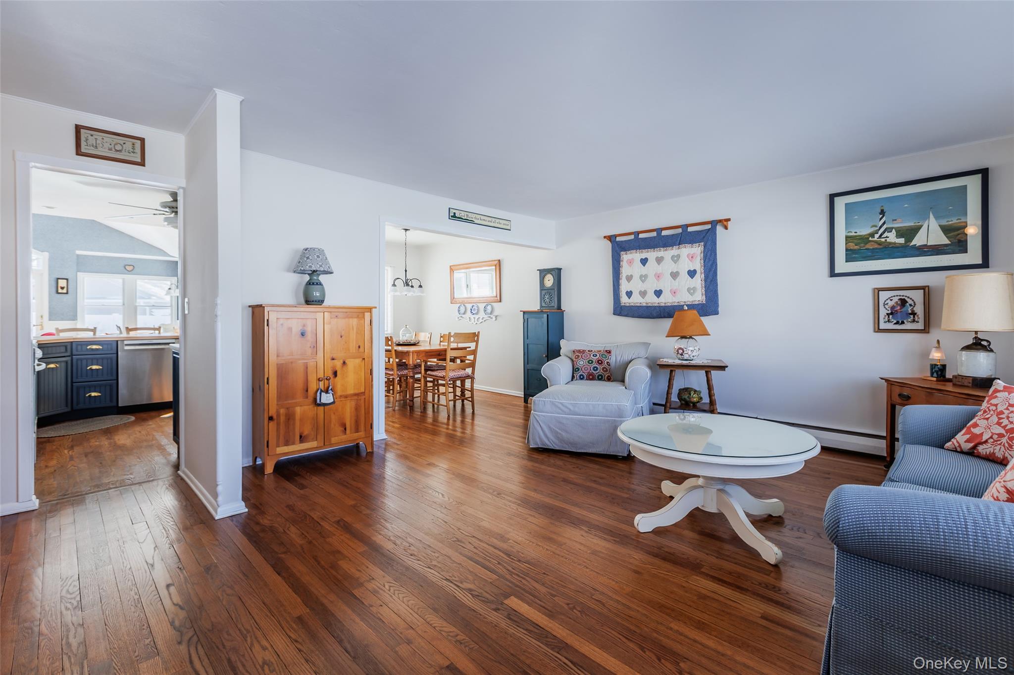 45 Terry Lane Commack, NY 11725 - Photo 6 of 34 a living room with furniture and a wooden floor
