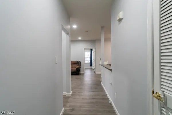 a view of a hallway with a couch