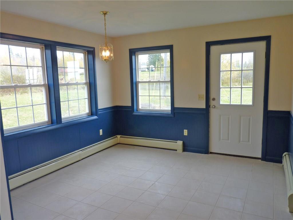 53 Libby Road Ellsworth, ME 04605 - Photo 12 of 23 Dining area and side entrance door.