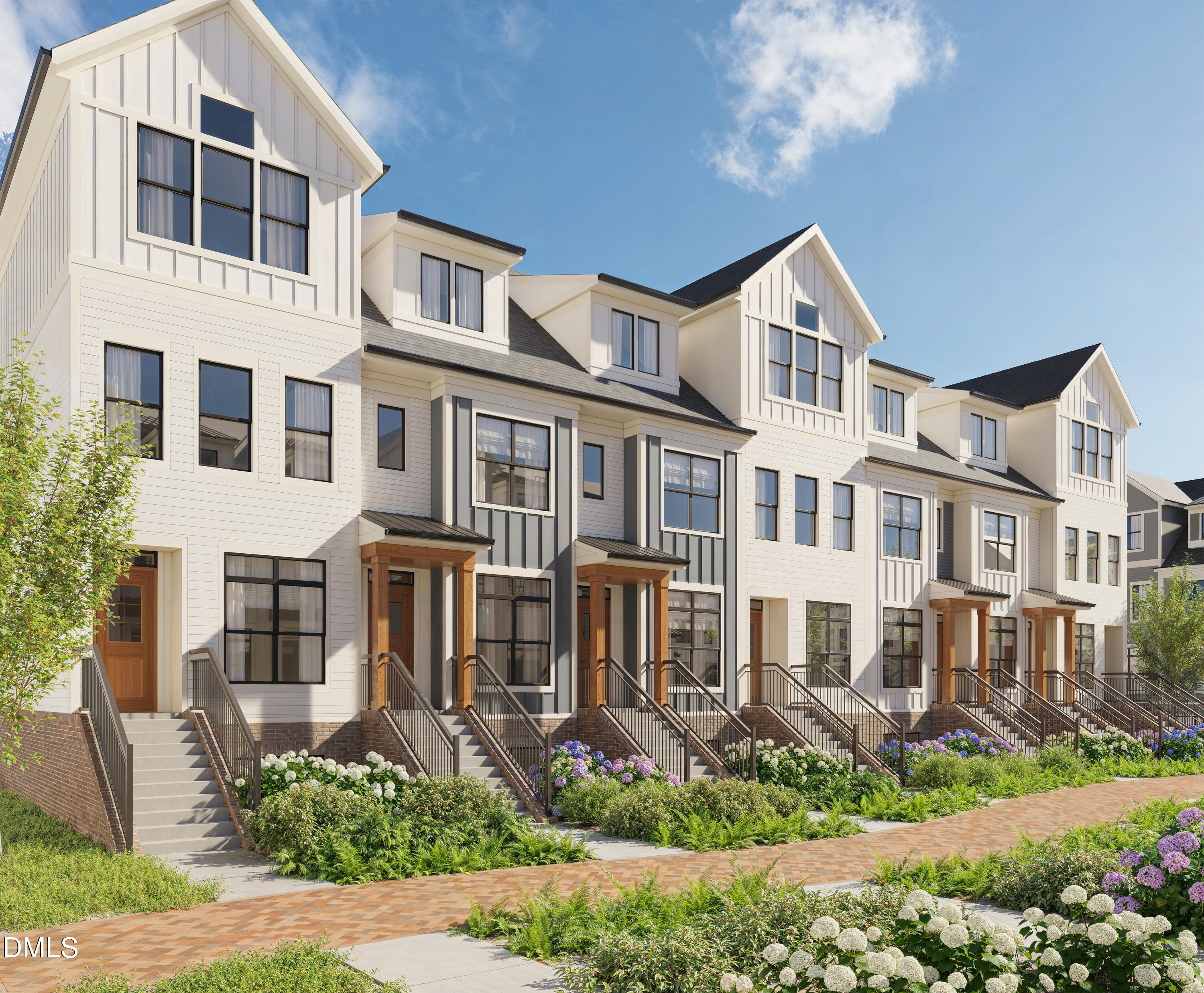 518 Morehead Avenue, Unit 101 Durham, NC 27701 - Photo 1 of 11 a view of a white house next to a yard