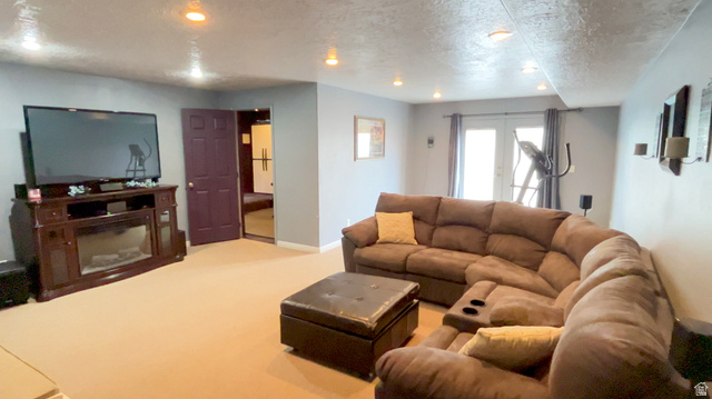 1797 Sunset Road Enoch, UT 84721 - Photo 36 of 80 Spacious living area featuring neutral carpeting and light gray walls