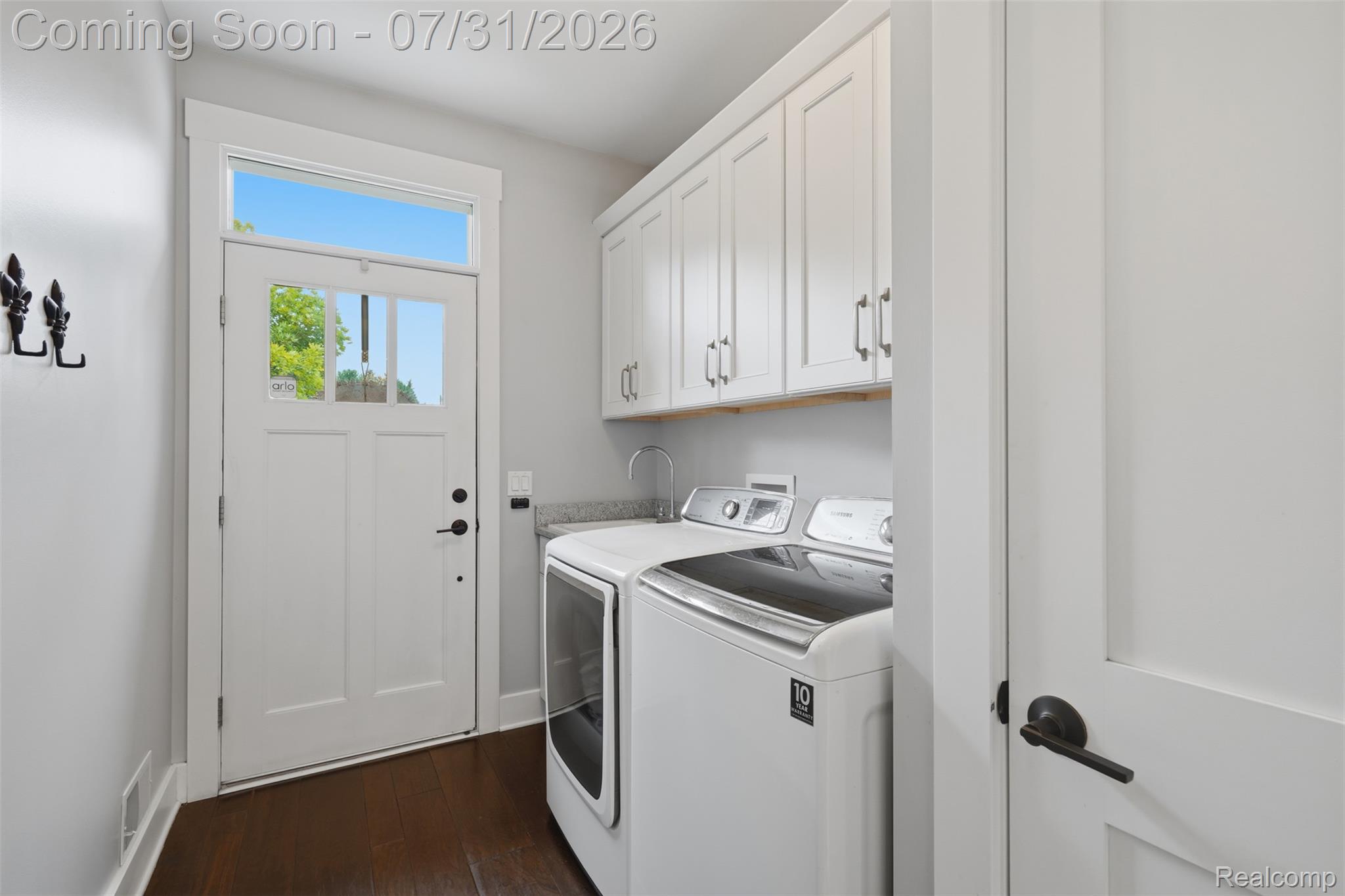8303 Hilton Road Brighton, MI 48114 - Photo 22 of 72 laundry room is on first floor is adjacent to garage and side door