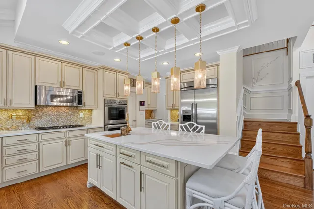 a kitchen with a sink and a large window