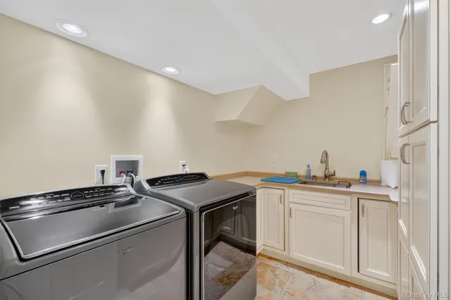 a bathroom with a granite countertop sink mirror and shower