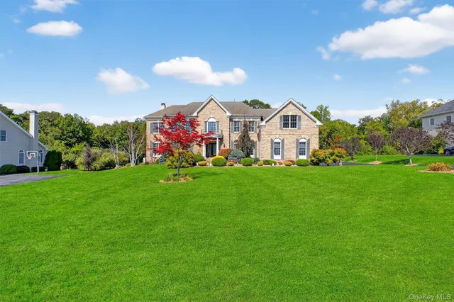 an aerial view of a house with a garden