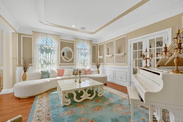 a living room with furniture and a table