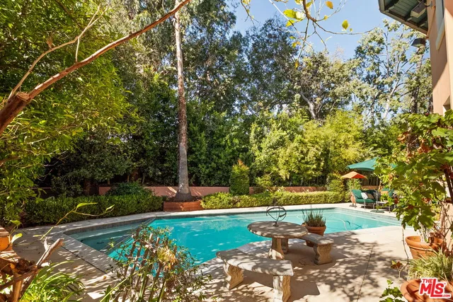 a view of a yard with an outdoor space