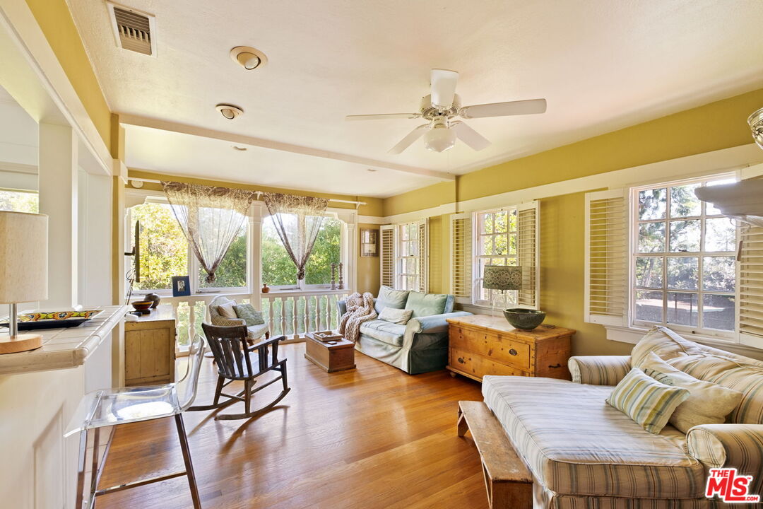 1205 Arden Road Pasadena, CA 91106 - Photo 18 of 24 a living room with furniture and a large window