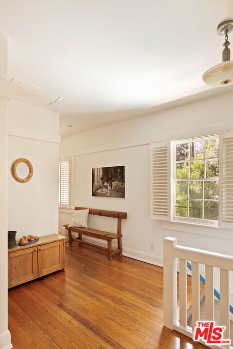 1205 Arden Road Pasadena, CA 91106 - Photo 22 of 24 a living room with furniture and a window