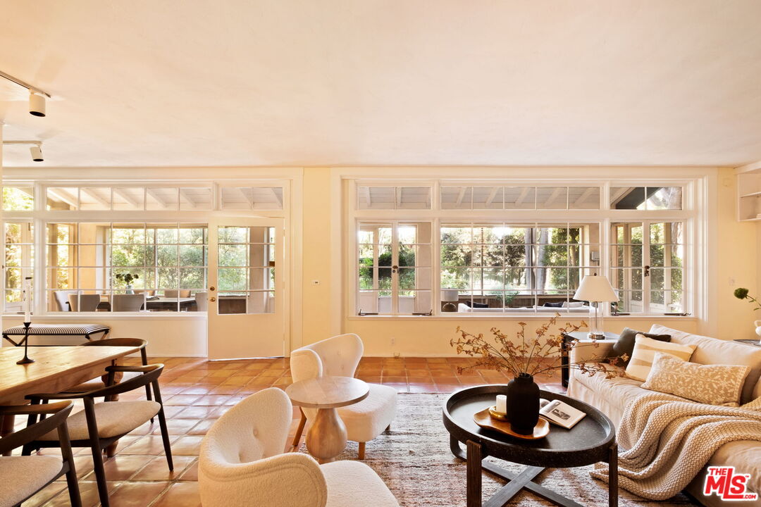 1205 Arden Road Pasadena, CA 91106 - Photo 8 of 24 a living room with furniture and a large window