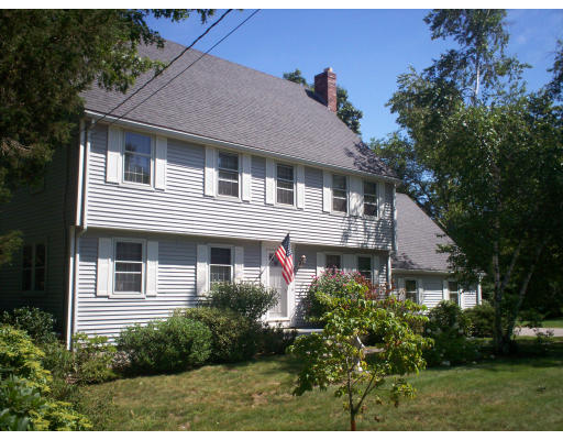 22 Spruce Road Medway, MA 02053 - Photo 1 of 17 a front view of a house with a yard
