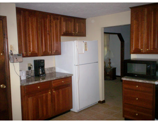 22 Spruce Road Medway, MA 02053 - Photo 15 of 17 a kitchen with a refrigerator stove and microwave