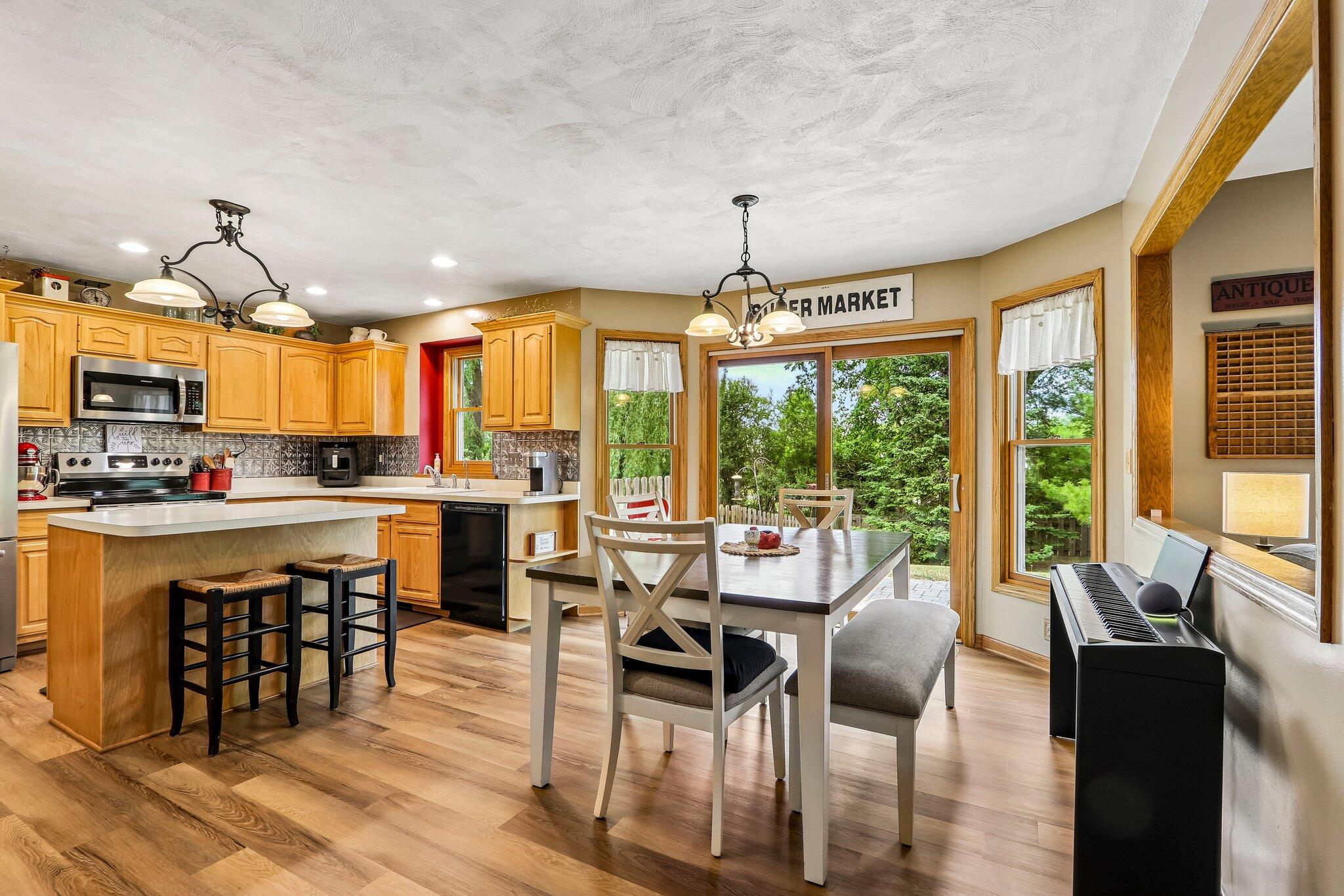 W5692 Sunset Ridge Road Walworth, WI 53184 - Photo 11 of 54 Dining to Kitchen