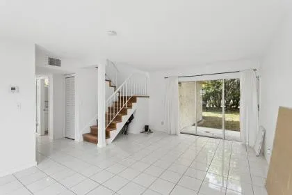 a view of an entryway with stairs