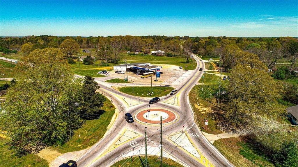 80 Highway 212 Covington, GA 30014 - Photo 4 of 7 a view of a swimming pool with a table chairs