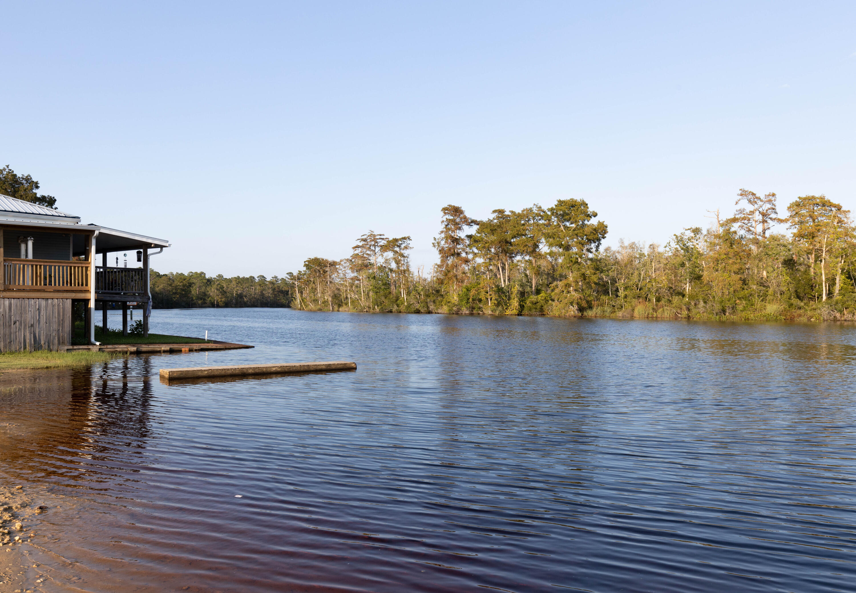 Lot Xx Stillwater Road Freeport, FL 32439 - Photo 14 of 20 a view of a lake with houses