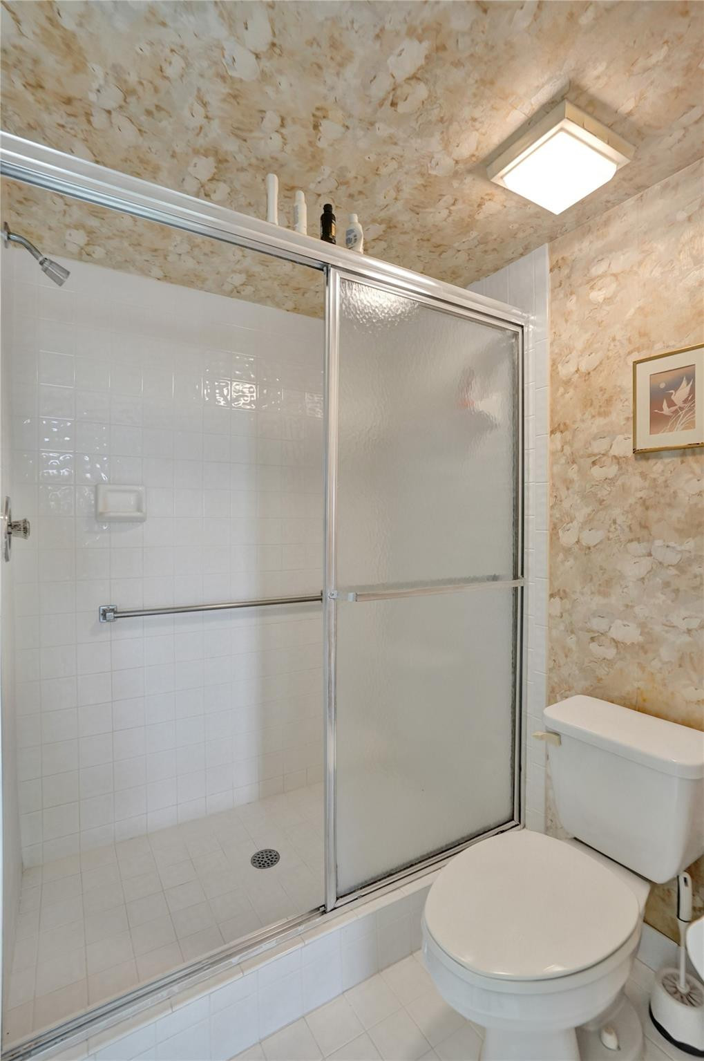 9575 Weldon Circle, Unit 305 Tamarac, FL 33321 - Photo 12 of 28 WALK IN SHOWER IN MASTER SUITE