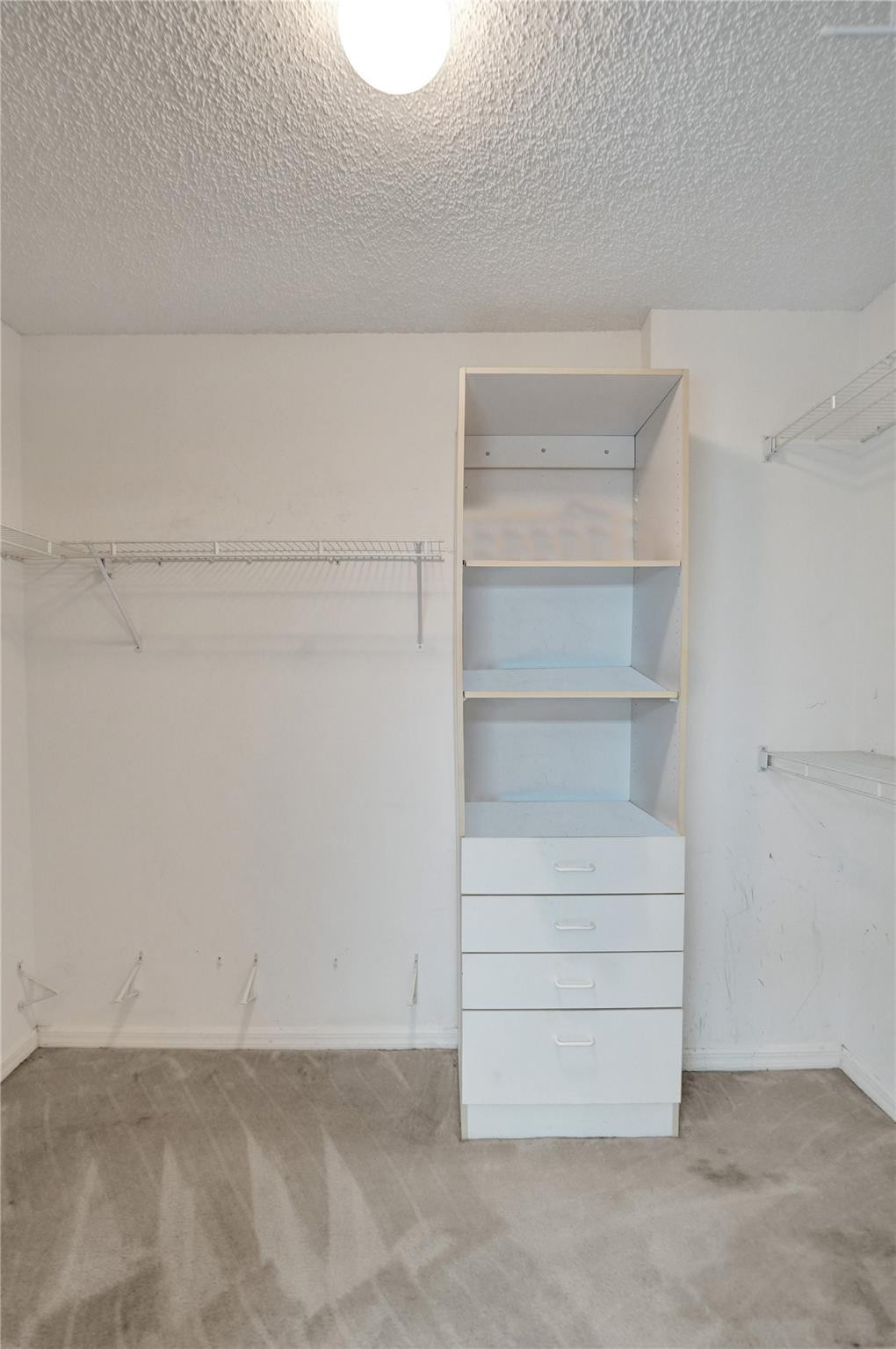 9575 Weldon Circle, Unit 305 Tamarac, FL 33321 - Photo 14 of 28 LARGE WALK IN CLOSET IN MASTER SUITE