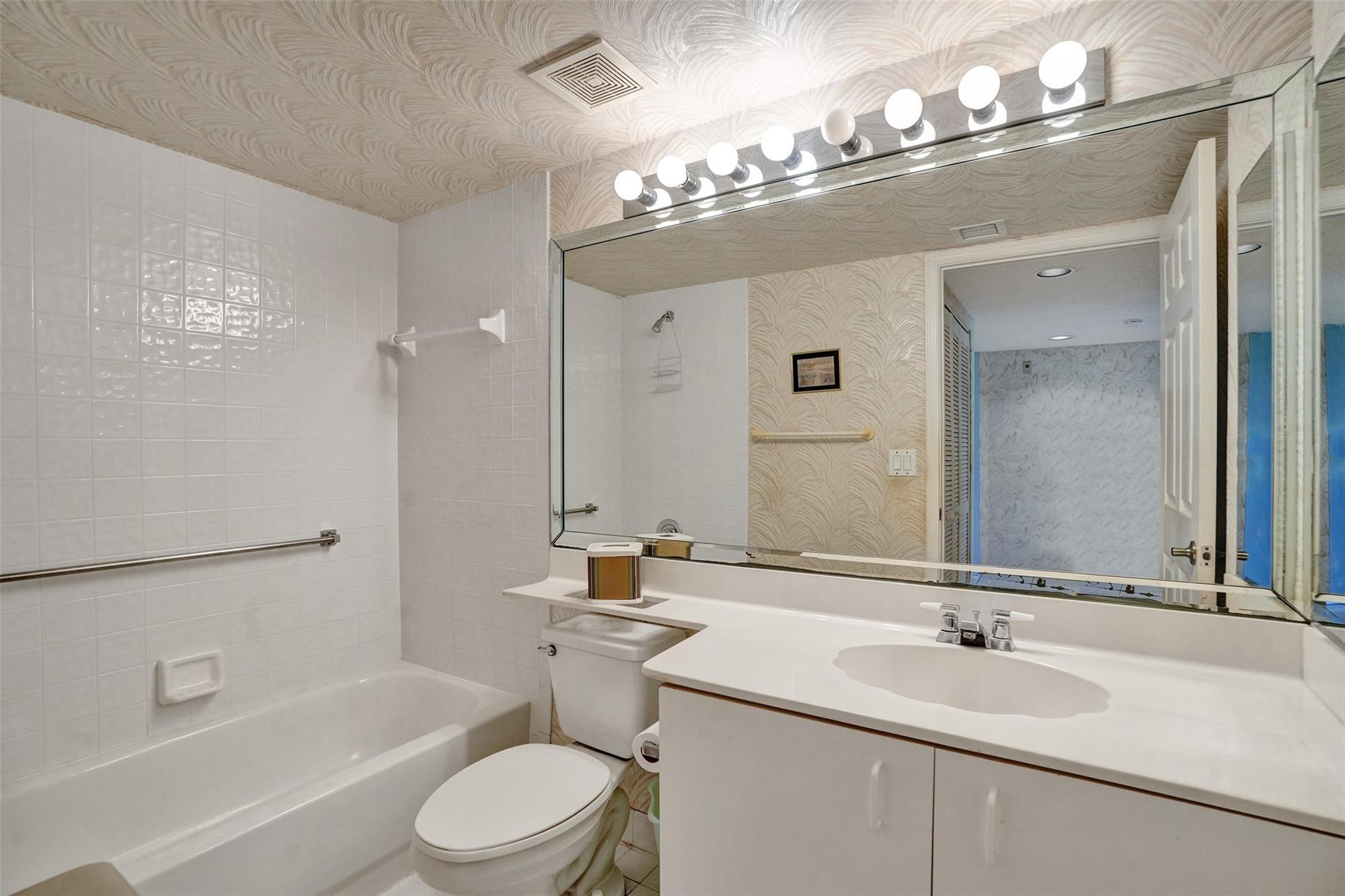 9575 Weldon Circle, Unit 305 Tamarac, FL 33321 - Photo 16 of 28 GUEST BATHROOM