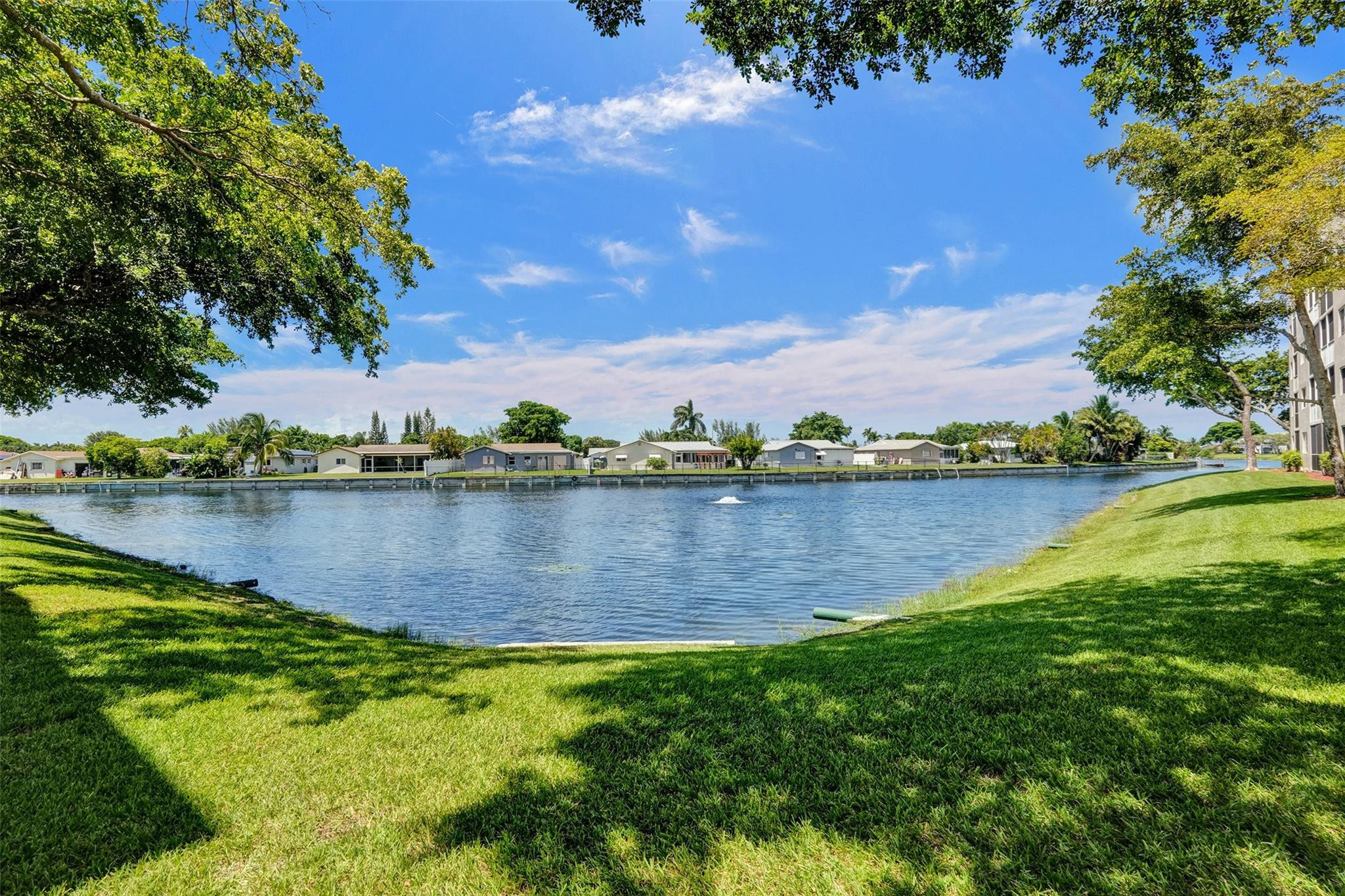 9575 Weldon Circle, Unit 305 Tamarac, FL 33321 - Photo 5 of 28 SUB PENTHOUSE VIEW OF LAKE