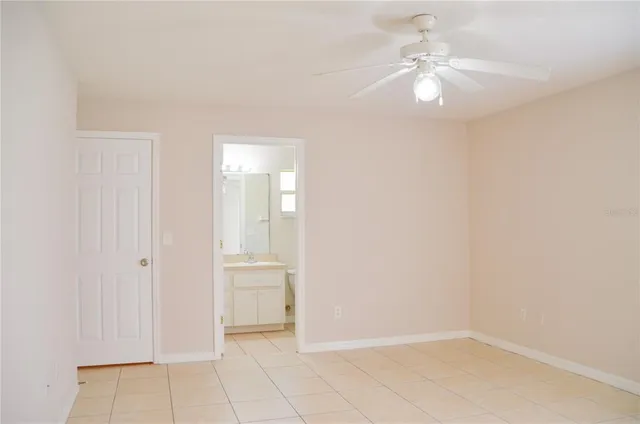 an empty room with a bathroom