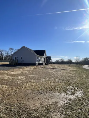 a view of a terrace with a lake