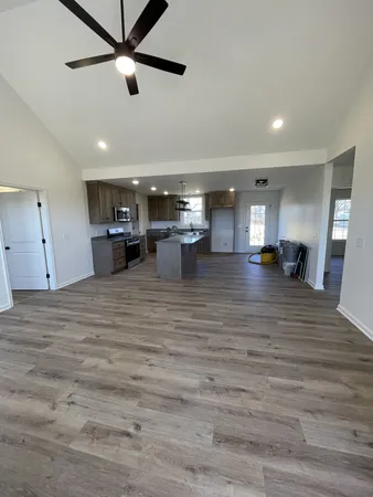 a kitchen with counter top space cabinets and stainless steel appliances