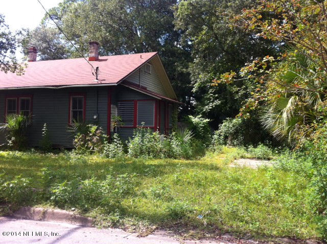 2017 Huntsford Road Jacksonville, FL 32207 - Photo 17 of 20 a view of a house with a yard and potted plants