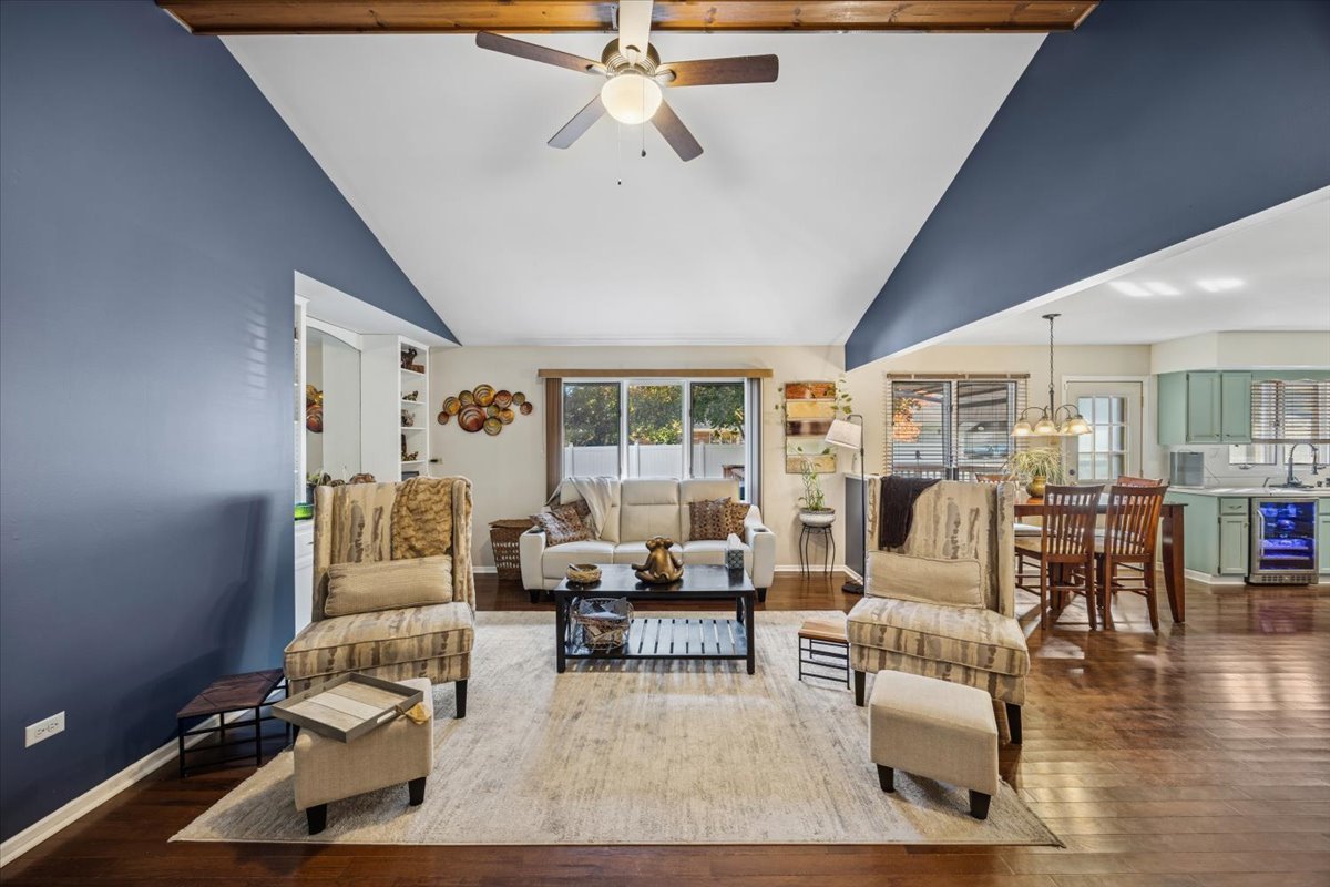 18311 Holland Road Lansing, IL 60438 - Photo 8 of 19 a living room with furniture and wooden floor