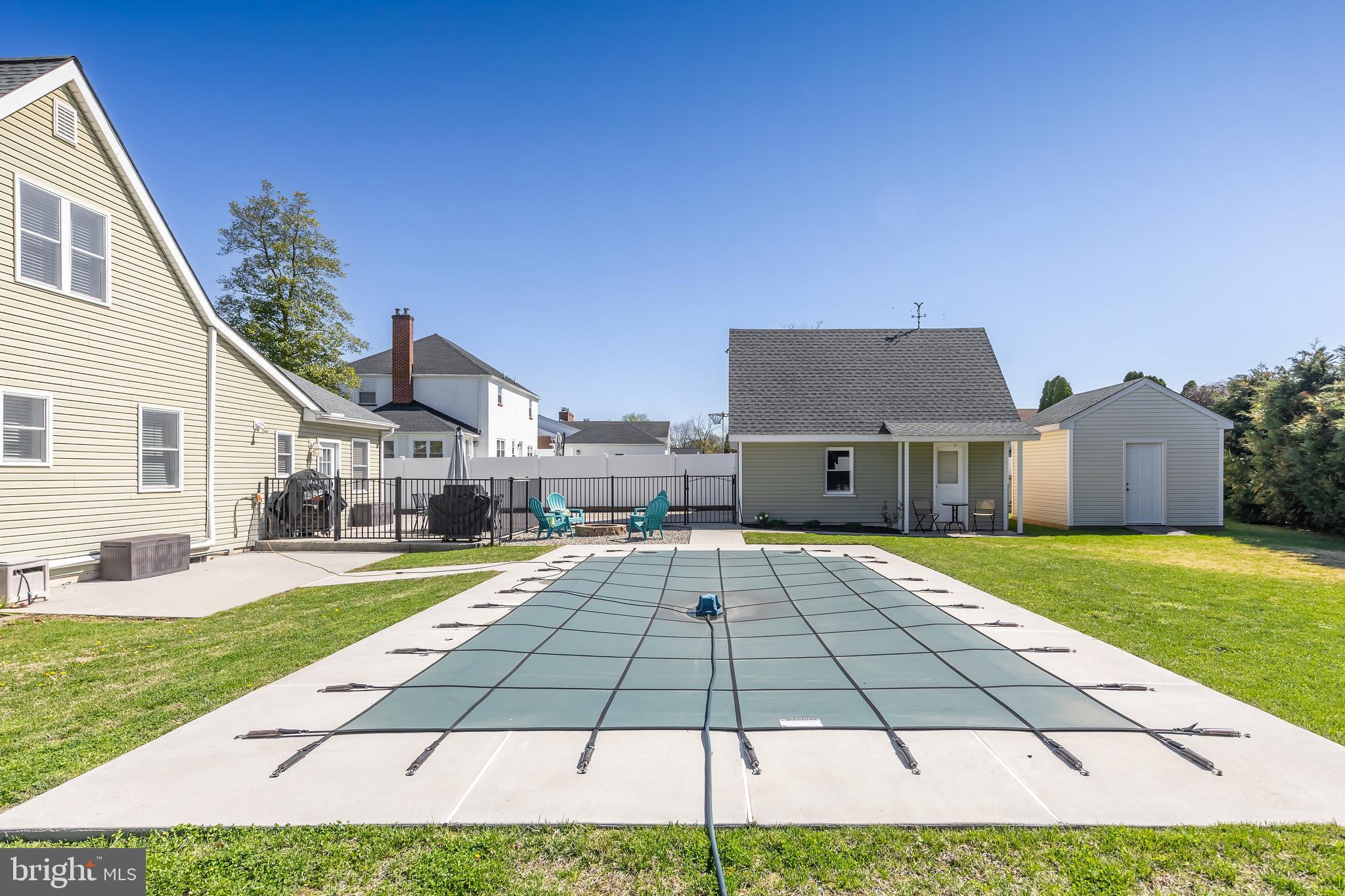 303 Main Street Mantua, NJ 08051 - Photo 46 of 50 a view of a house with a yard and sitting area