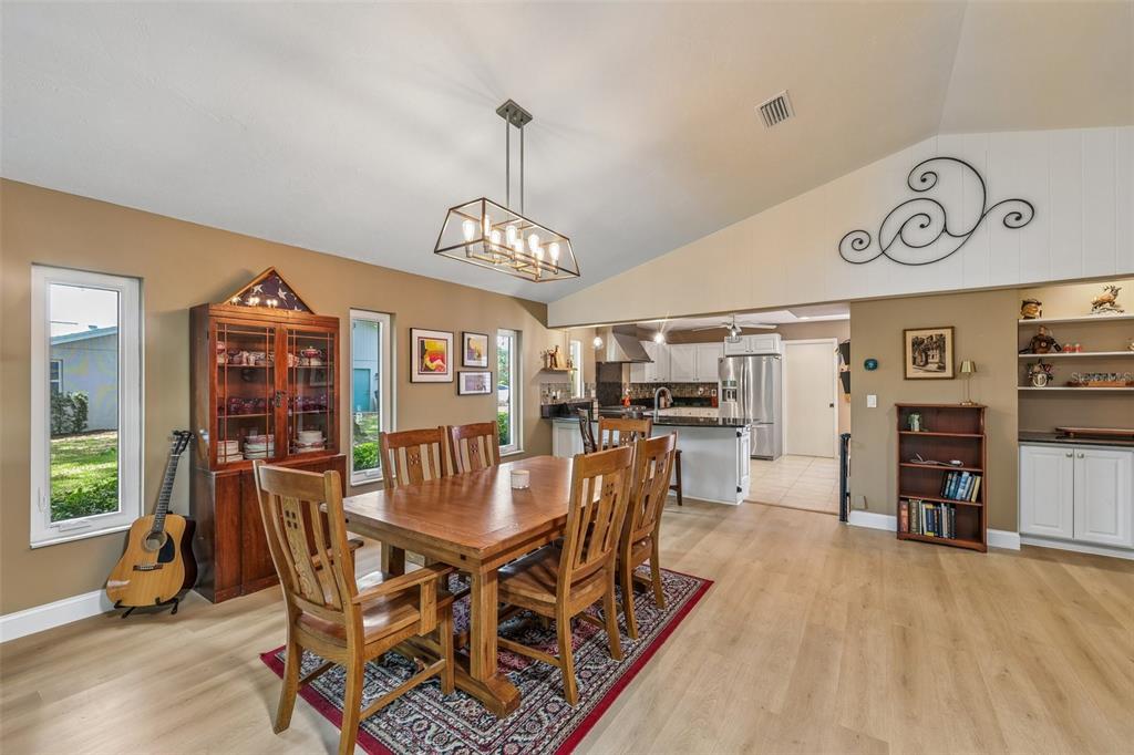 3757 Countryside Road Sarasota, FL 34233 - Photo 11 of 34 a dining room with furniture and window