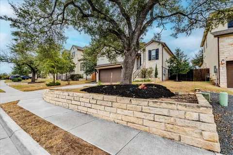 a view of a street with houses