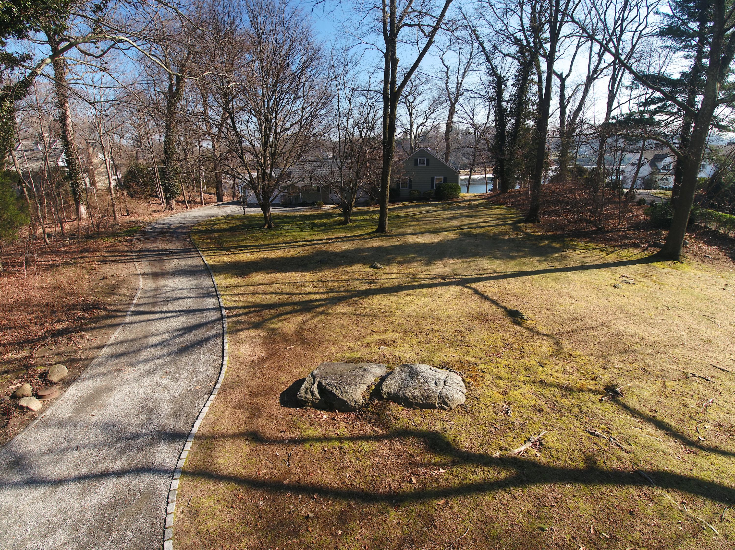 30 Pasture Lane Darien, CT 06820 - Photo 13 of 14 a view of a yard with plants and trees