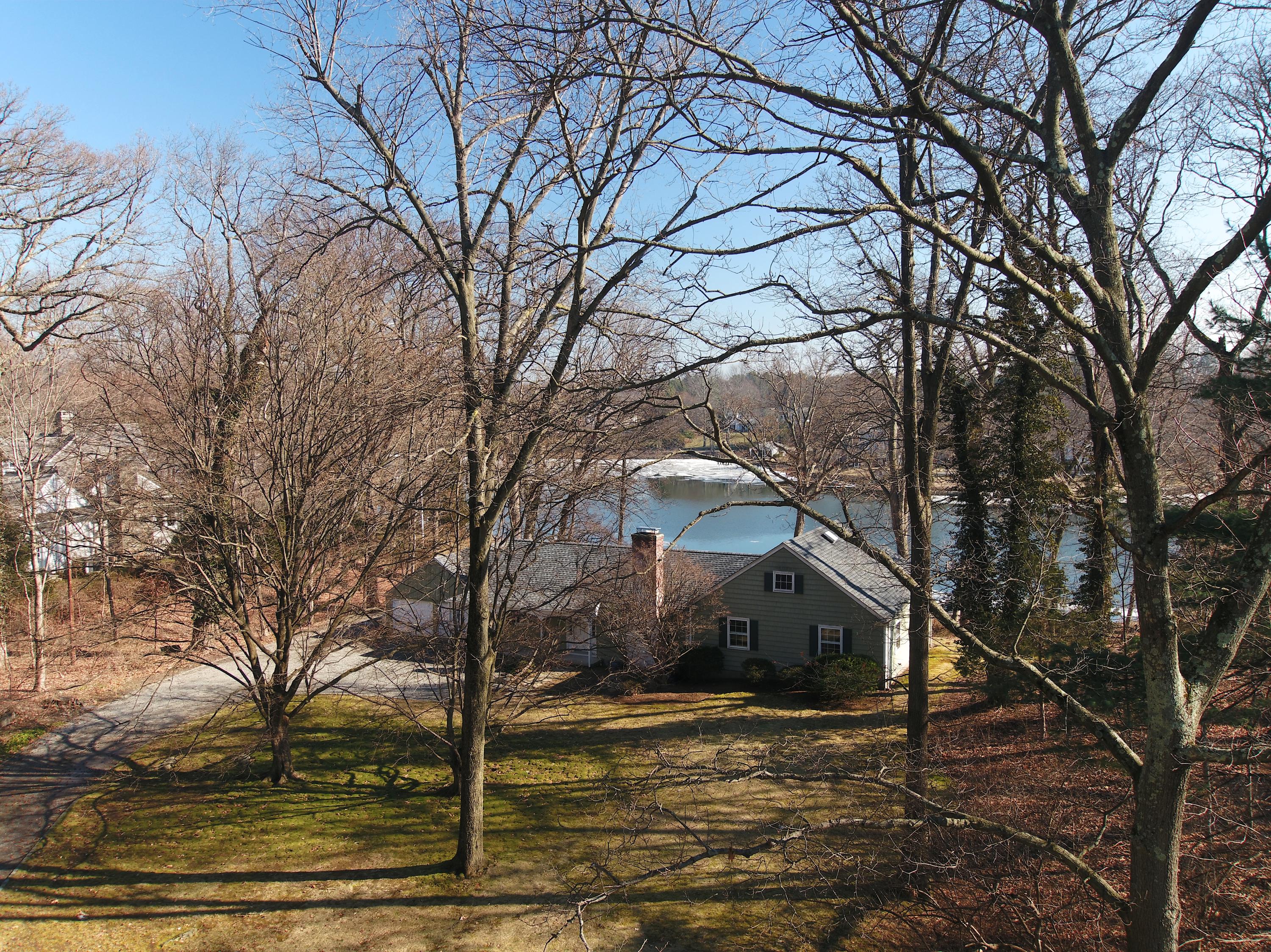 30 Pasture Lane Darien, CT 06820 - Photo 6 of 14 a view of a house with a yard