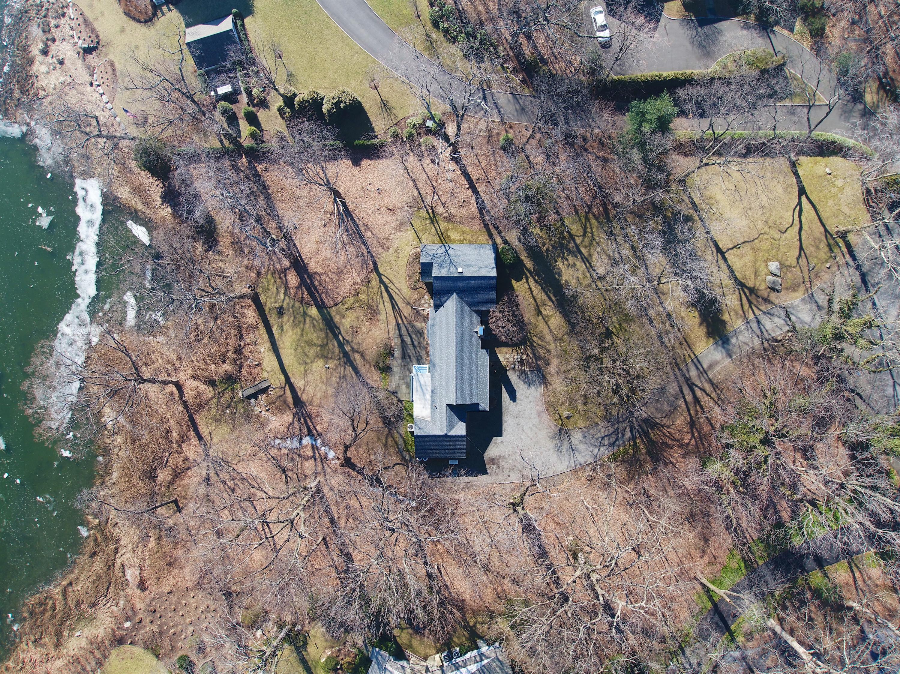 30 Pasture Lane Darien, CT 06820 - Photo 9 of 14 a view of a house with a yard