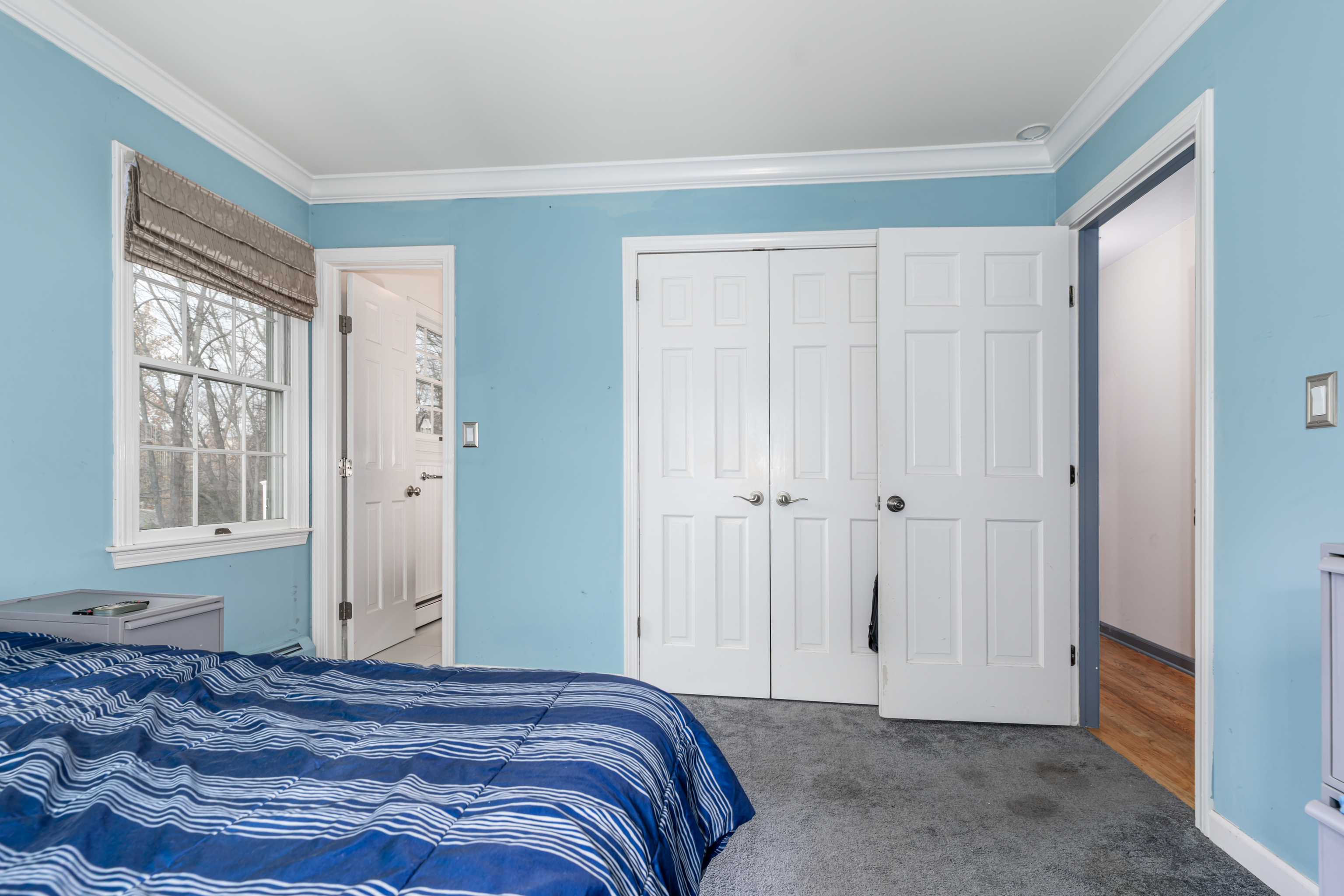 224 Roses Mill Road Milford, CT 06460 - Photo 13 of 30 a bedroom with a bed and a window