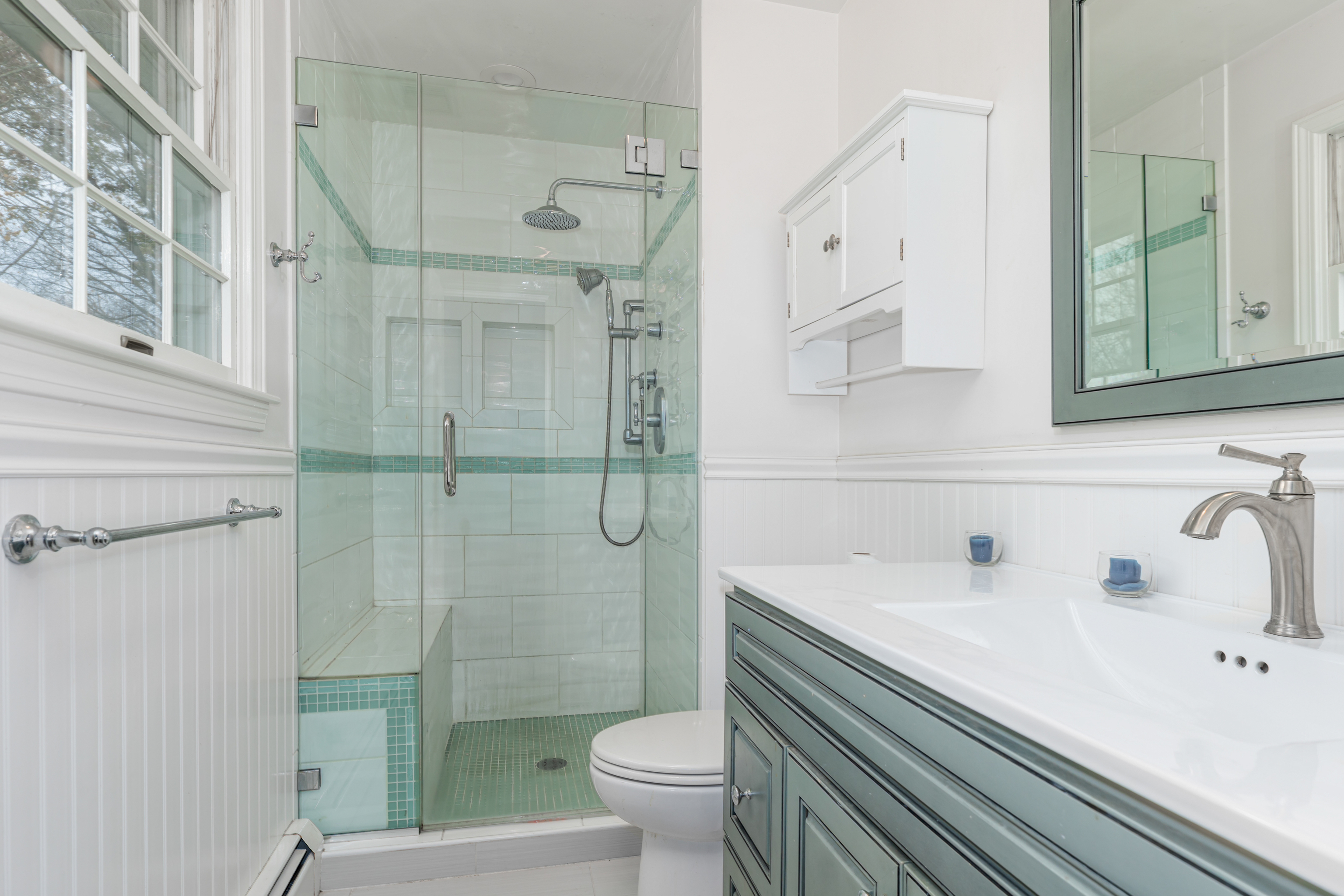 224 Roses Mill Road Milford, CT 06460 - Photo 14 of 30 a bathroom with a sink a toilet and shower